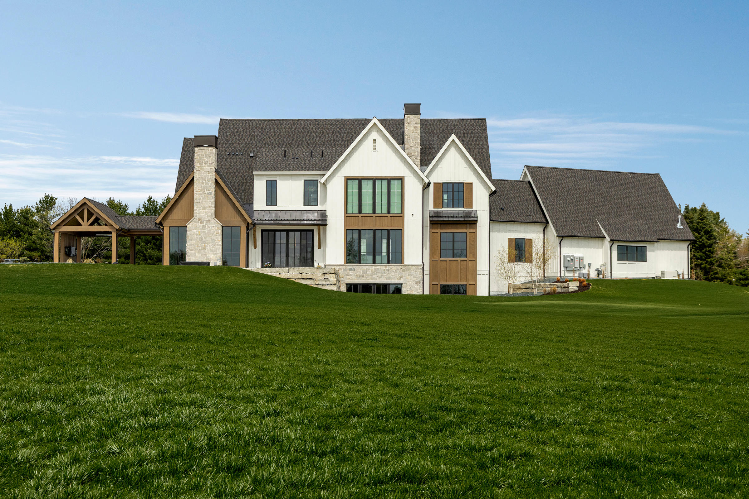 Horizon House modern farmhouse exterior with black gable roof