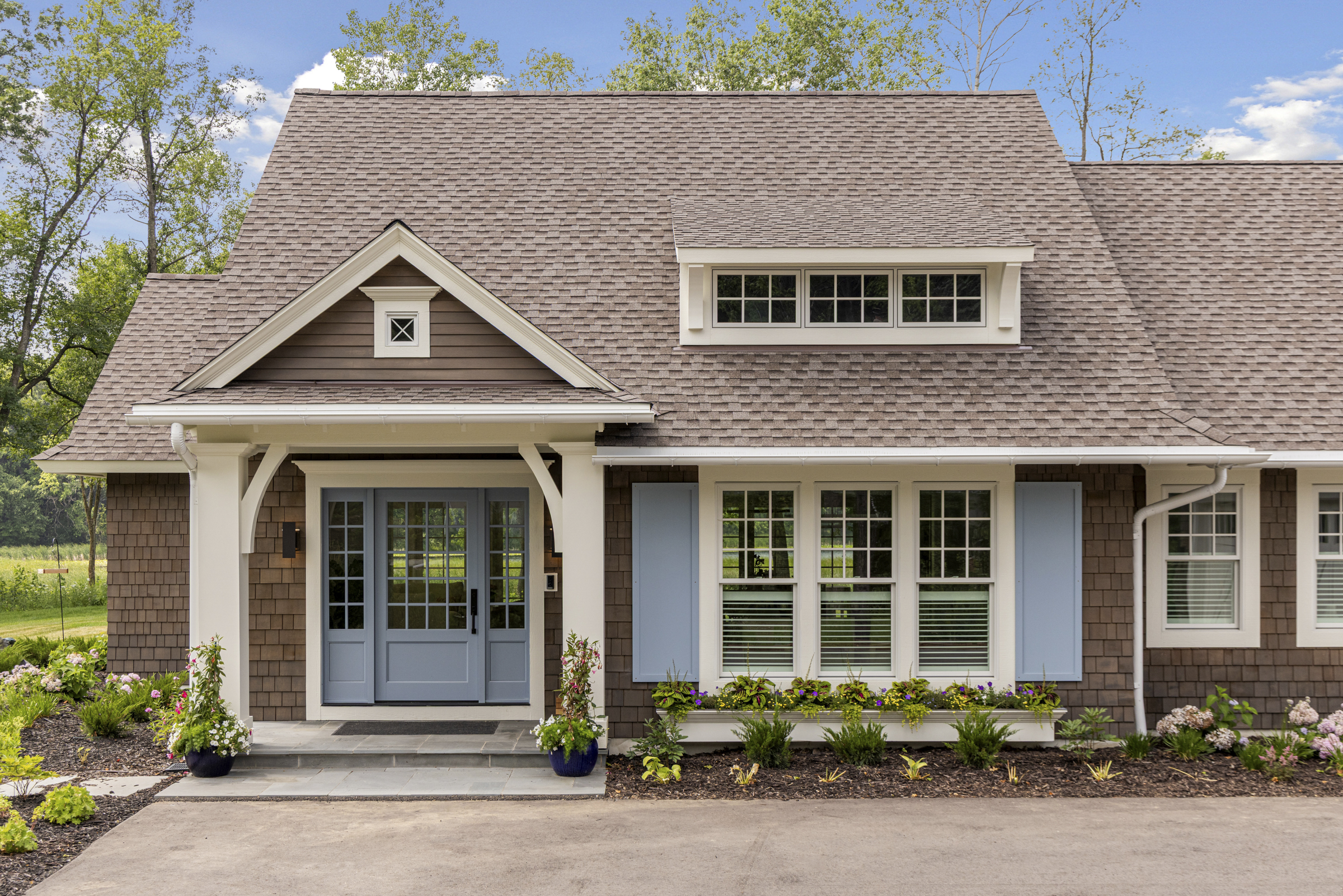 Stonewood custom home exterior showcasing quality craftsmanship in Minnesota